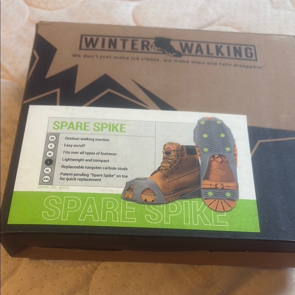 Spare Spike Traction Device—- like new, never removed from box